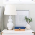 Photo of nightstand with photo frame.